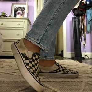 black and white slip on vans